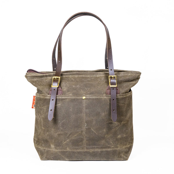 Backside view of a waxed canvas Boardwalk Tote. 
