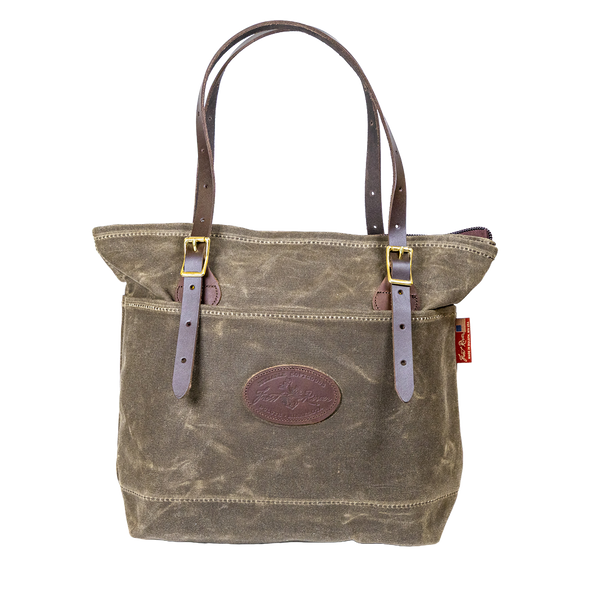 Waxed canvas and leather tote bag designed for everyday use.