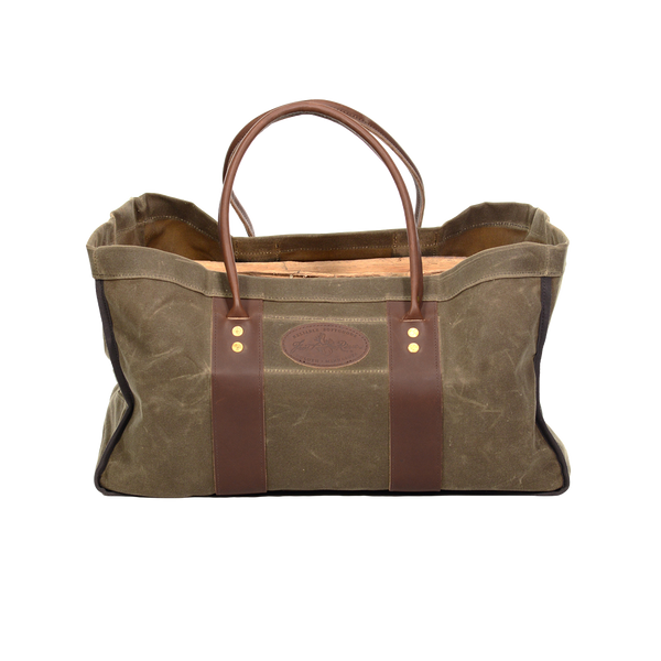 Waxed canvas and leather four sided log carrier bag. 