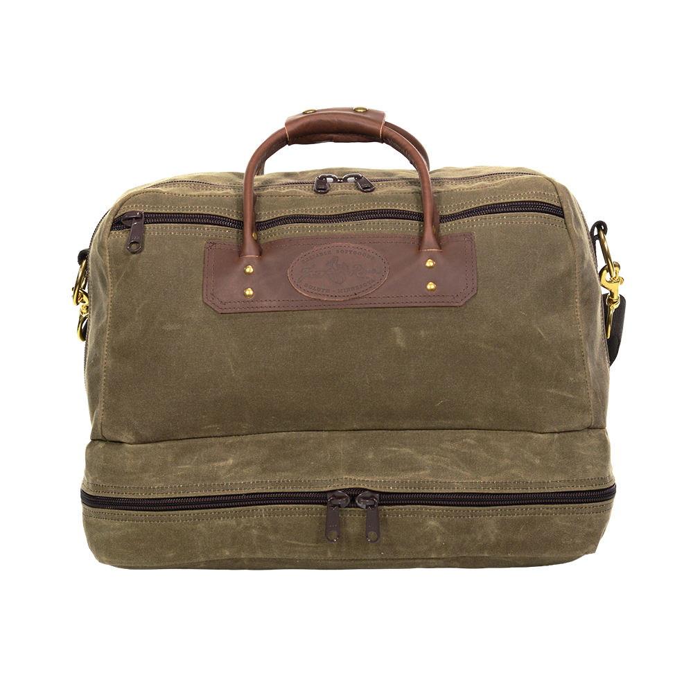 Waxed Canvas and leather duffel bag with a separate compartment for boots or dirty clothes. 