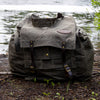 Frost River's waxed canvas canoe pack sitting at the end of a portage. 