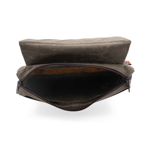 An open view of Frost River's waxed canvas Canoe Seat Bag. 