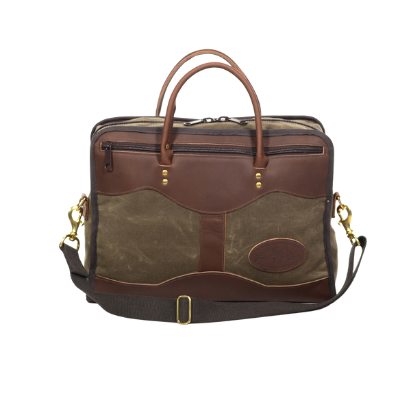 With high-end waxed canvas and premium leather this medium brief is durable and striking. Two leather handles on both sides for carrying and two heavy duty zippers on either side for storage. 