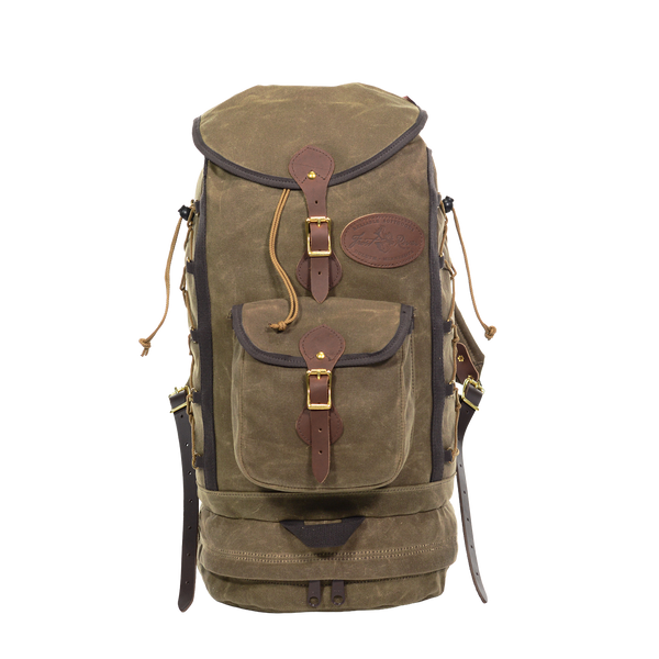 Handmade large daypack made with waxed canvas premium leather and high quality brass buckles and rivets.