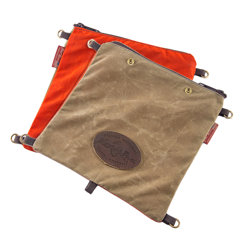 The Windigo Signal Bag is a great addition to any of our packs.  One side is made from our field tan waxed canvas and the other is made from our hunters orange waxed canvas.