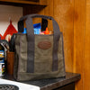 Lake Huron Tote sits on counter full of supplies. 