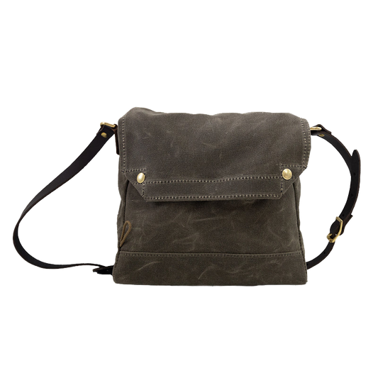 A field tan waxed canvas satchel.