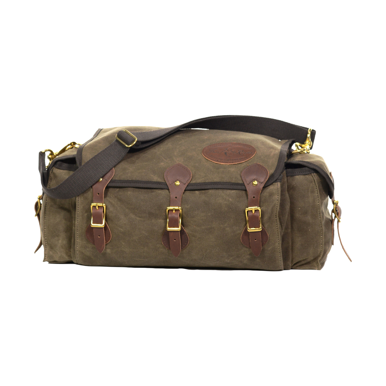 A soft sided tackle box crafted from waxed canvas, leather, and solid brass. 