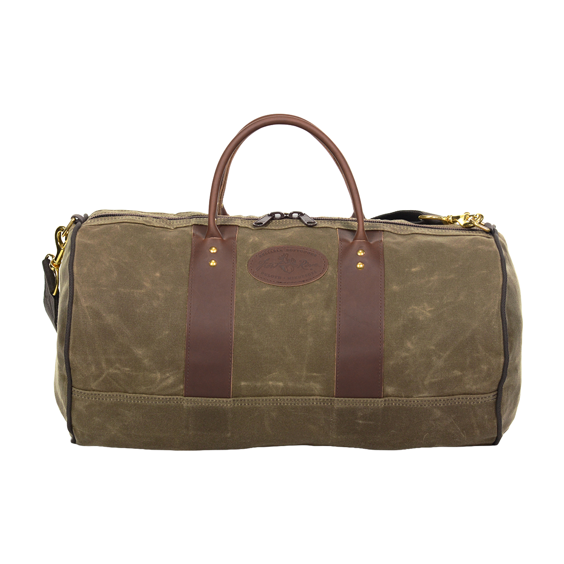Classic round shaped duffel bag made from 18 ounce waxed canvas, full grain leather, and solid brass hardware.