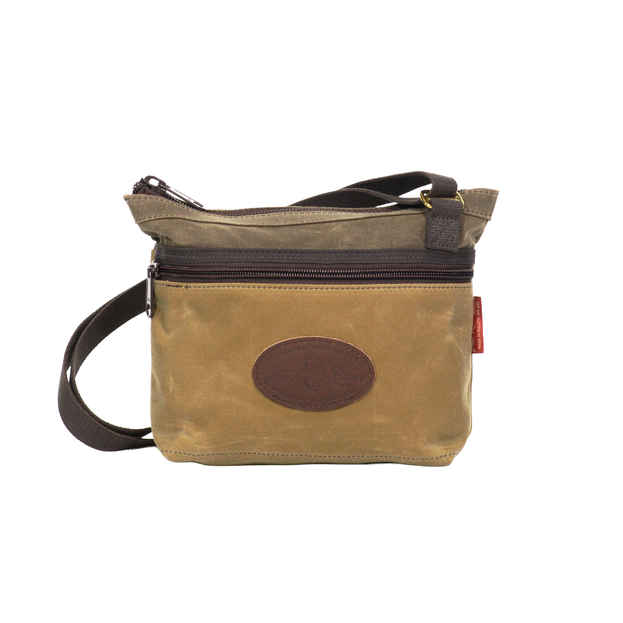 A field tan waxed canvas shoulder bag. 